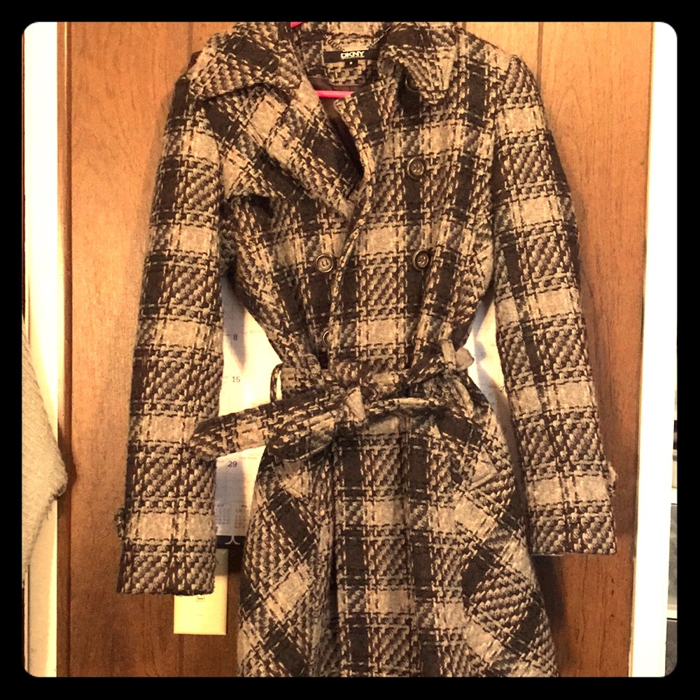 A double breasted dress coat with a tie belt.